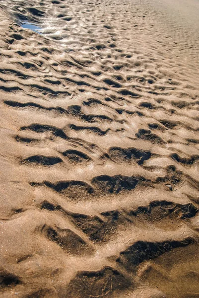 Luz y sombras sobre arena en la playa de Portugal —  Fotos de Stock