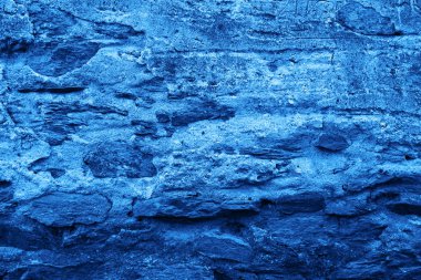 Klasik mavi renkli beton duvar taşından duvar dokusu. 2020 yılının kavramsal rengi