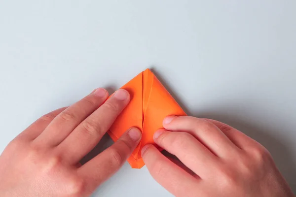 Step by step photo instruction. How to make origami paper boat. DIY for children. Childrens art project craft for kids