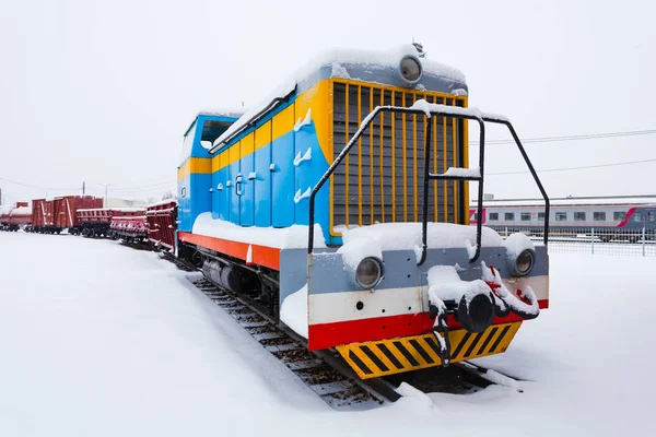 Freight train on the winter background