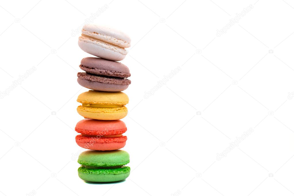Colorful macaroons tower isolated on white