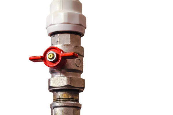 Isolated plumbing valve with red faucet on the plastic water pipe of plumbing system. Close-up. — Stock Photo, Image