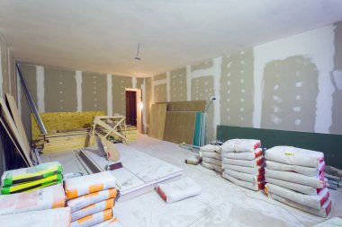 Malzeme inşaat (macun paketleri, sayfa Alçıpan veya Alçıpan) daire için yapım aşamasında, tadilat, yenileme, uzantısı, restorasyon ve yeniden yapılanma olduğunu.
