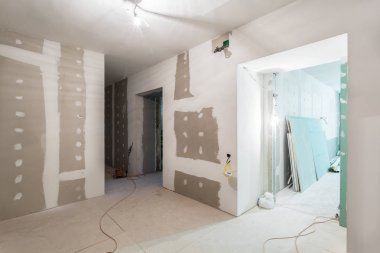 Metal çerçeveler ve Alçıpan - Alçıpan - alçı duvarlar ve dairede elektrik telleri için değil yapım aşamasında, tadilat, yenileme, uzantısı, restorasyon ve rekonstrüksiyon