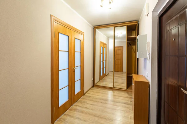 Interior of hallway apartment with furniture after the remodeling, renovation, extension, restoration, reconstruction and construction. — Stock Photo, Image