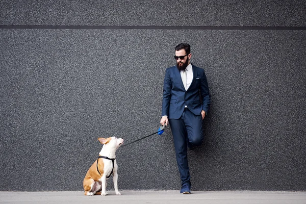 Business man with his dog.