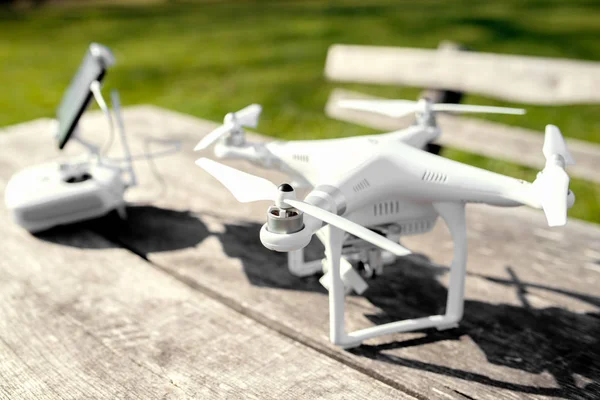 Aerial Drone standing on wooden table — Stock Photo, Image