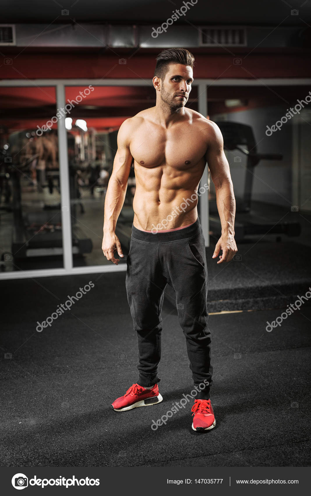 https://st3.depositphotos.com/4259987/14703/i/1600/depositphotos_147035777-stock-photo-fit-man-working-out-at.jpg