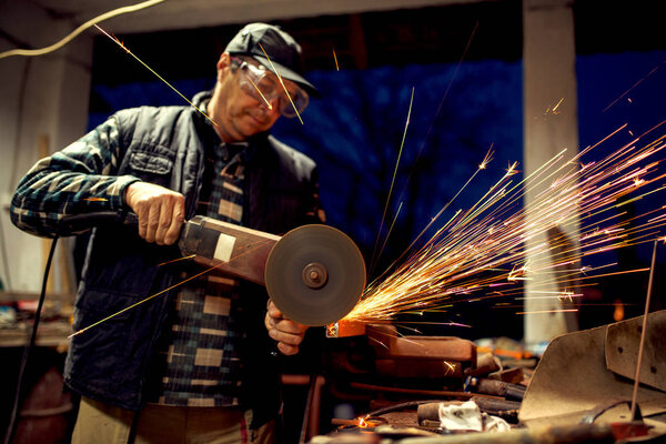 Middle aged man at workshop — Stock Photo, Image