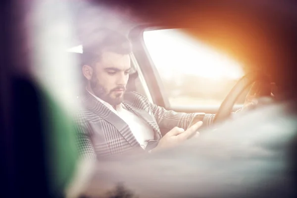 Businessman driving modern car — Stock Photo, Image