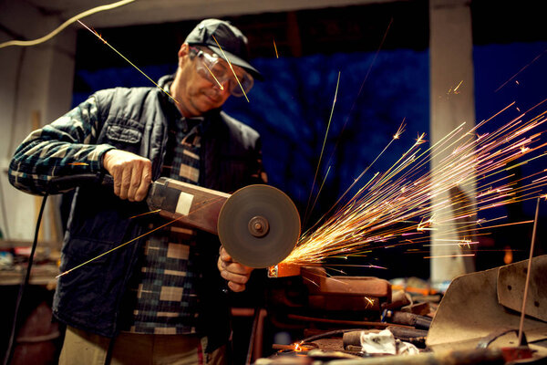 Middle aged man at workshop Stock Picture