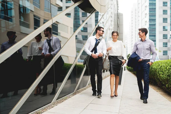 Group of business people walking talking. — Stock Photo, Image