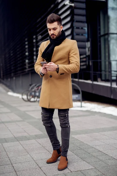 Handsome man with his phone — Stock Photo, Image