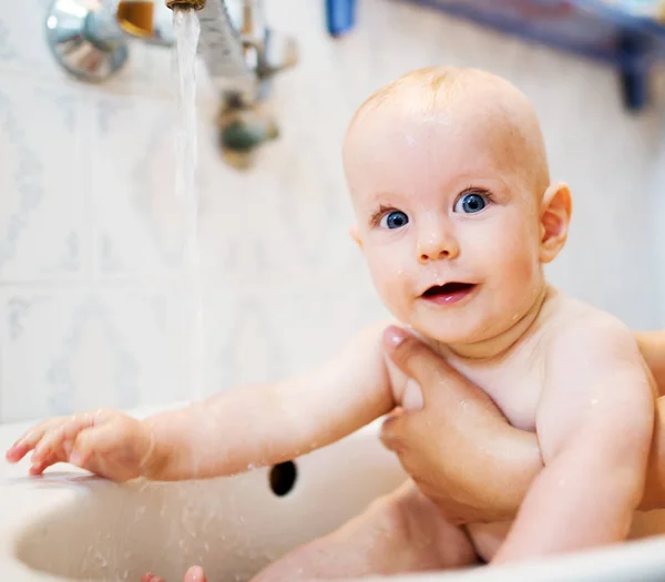 Pretty smiling baby taking bath Stock Photo by ©dusanpetkovic 161197322