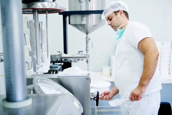 Lab technician checking the production — Stock Photo, Image