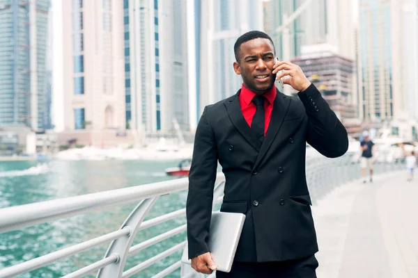 African American Businessman Suit Smartphone Walking River City Skyscrapers — Stock Photo, Image