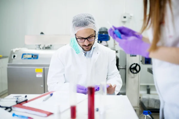 Scientists preparing quality test — Stock Photo, Image