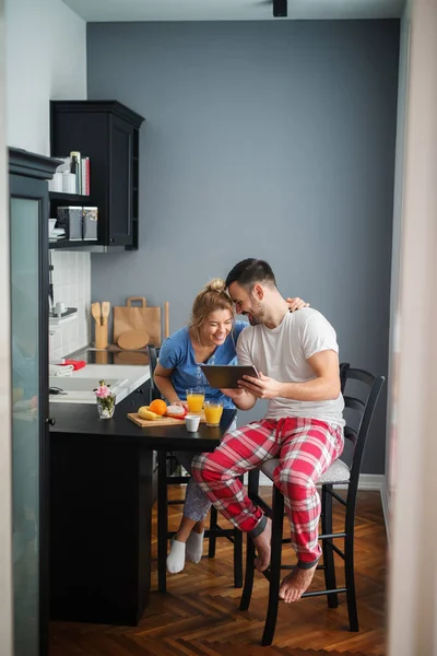 Smiling Attractive Loving Couple Having Breakfast Together Kitchen Pajamas Reading — Stock Photo, Image