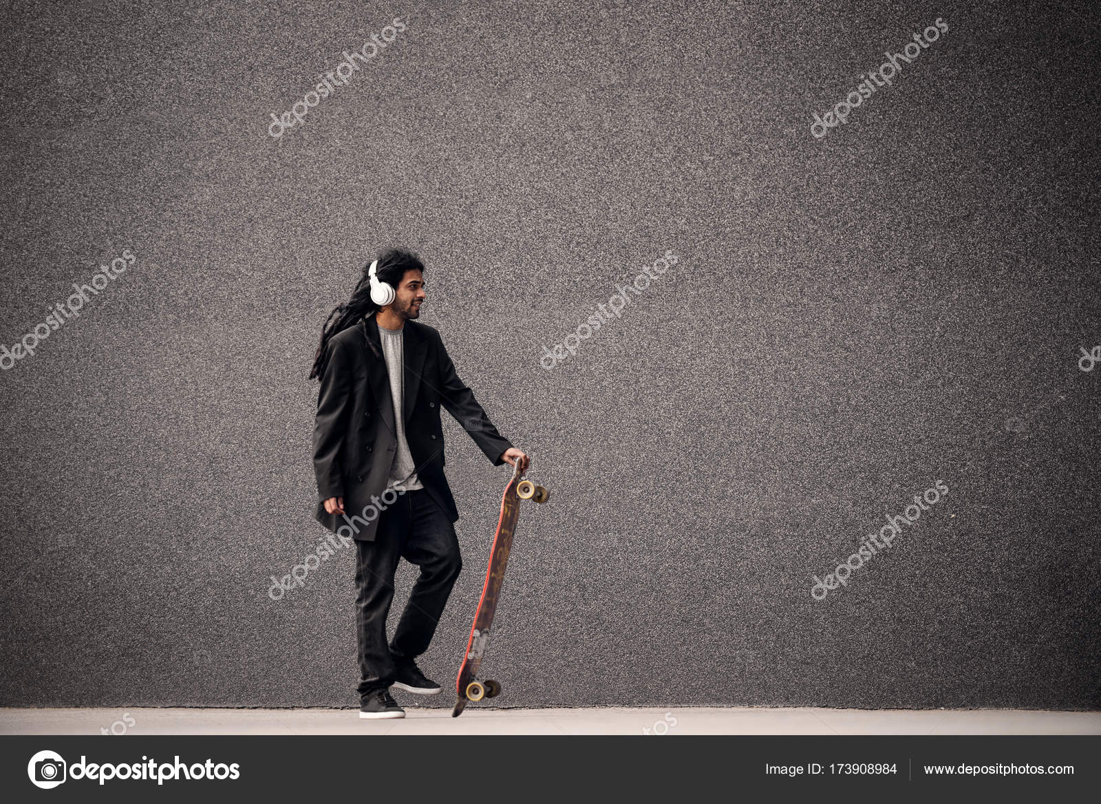 Young skater with dreadlocks Stock Photo by ©dusanpetkovic 173908984