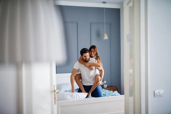 Beautiful Young Woman Man Pajamas Having Fun Bedroom Funny Piggyback — Stock Photo, Image