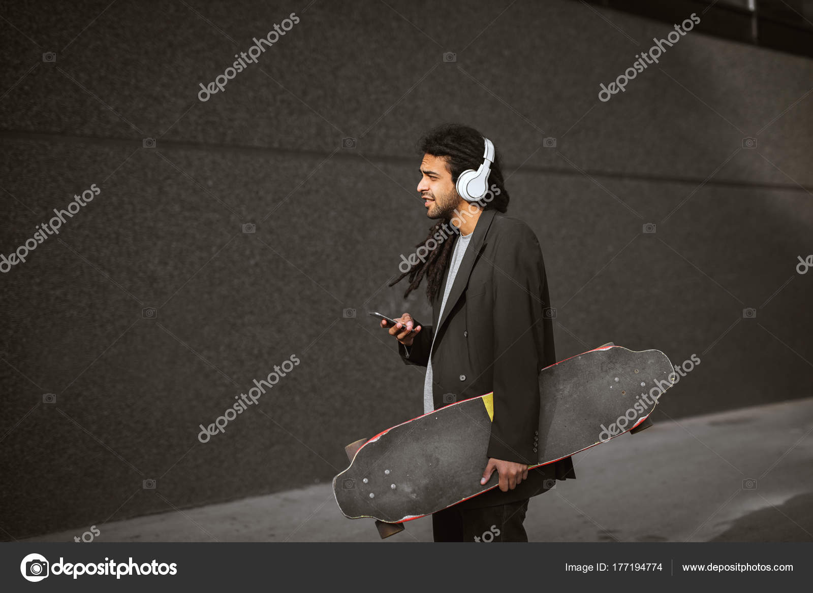 Handsome Young Stylish Skater Dreadlocks Using Smartphone Street Stock