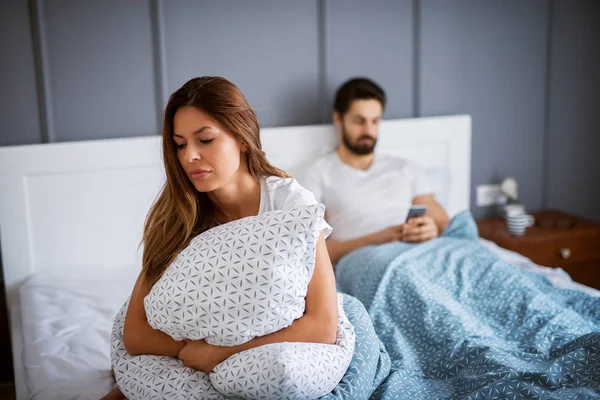 Young Sad Woman Sitting Bed Hugging Pillow Boyfriend Mobile Hands — Stock Photo, Image