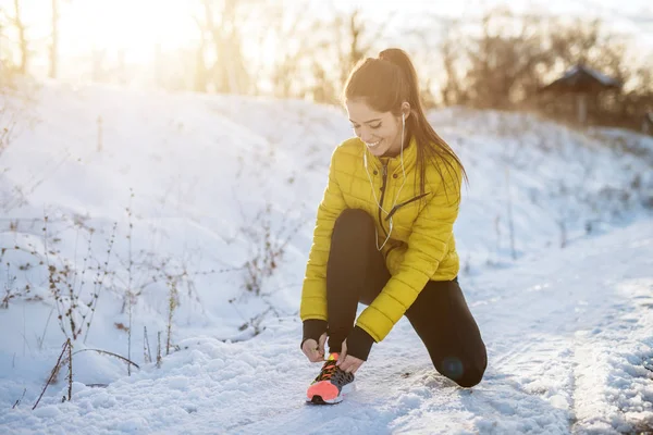 Young Active Sporty Woman Tying Shoelaces Snowy Winter Road — Stock Photo, Image