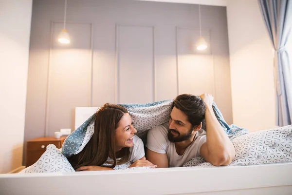 Couple in pajamas bedroom — Stock Photo, Image