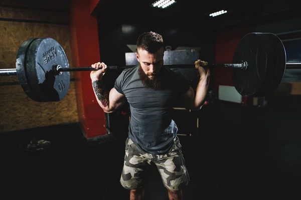 Bearded Strong Bodybuilder Doing Squats Heavy Barbell Gym — Stock Photo, Image