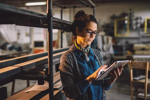 Happy Beautiful Businesswoman Holding Tablet Standing Shelf Metal Pipes Workshop — Stock Photo, Image