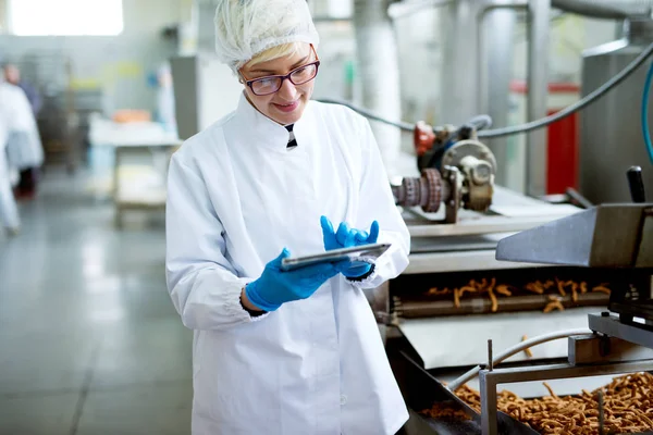 Young Female Worker Holding Tablet Standing Salt Sticks Factory Production — Stock Photo, Image