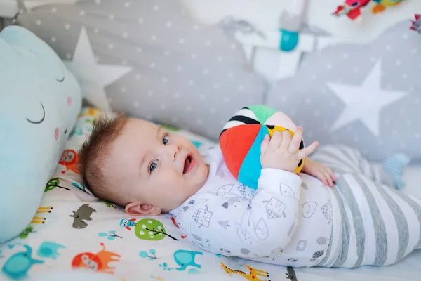 Precious Caucasian Little Baby Boy Lying His Crib Playing Stuffed — Stock Photo, Image