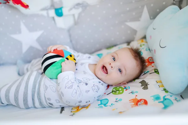 Cute Caucasian Little Baby Boy Lying His Crib Playing Stuffed — Stock Photo, Image