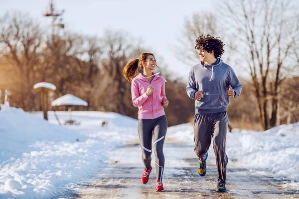 Happy Smiling Caucasian Couple Sportswear Running Nature While Looking Each — Stock Photo, Image