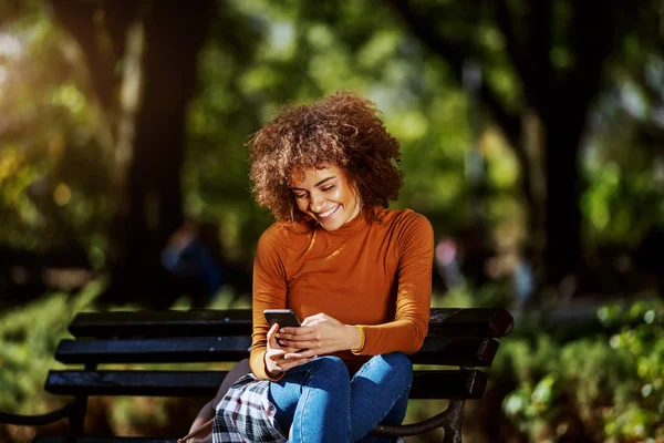 Lovely Young Smiling Mixed Race Woman Turtleneck Curly Hair Sitting — Stock Photo, Image