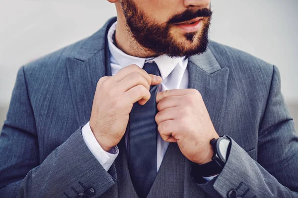 Handsome Caucasian Bearded Businessman Suit Fixing His Tie — Stock Photo, Image