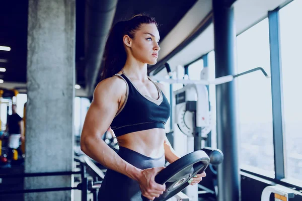 Side View Strong Muscular Caucasian Woman Sportswear Ponytail Holding Weight — Stockfoto