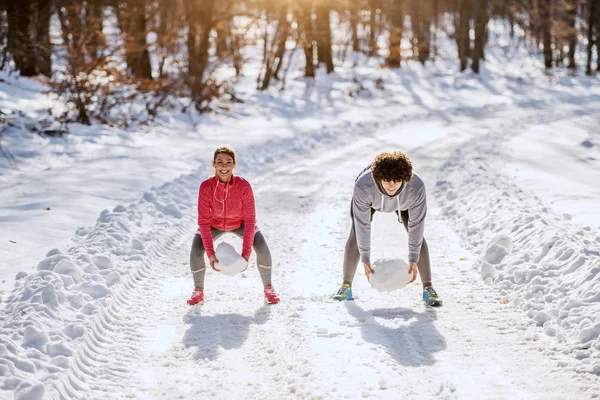 Happy Fit Caucasian Couple Sportswear Squatting Footpath Doing Endurance Big — 스톡 사진