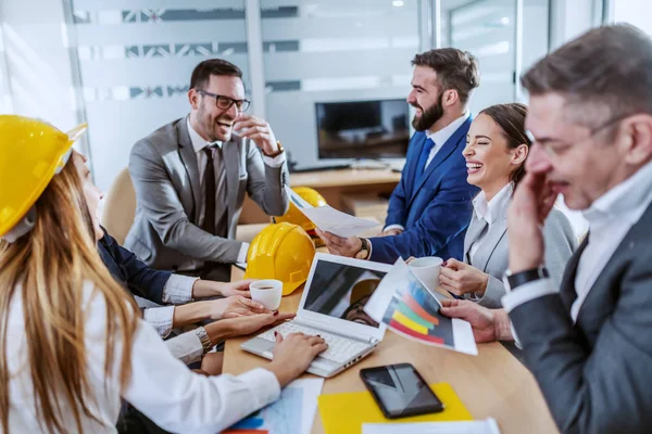 Group Positive Smiling Architects Sitting Boardroom Chatting Laughing — Stok fotoğraf