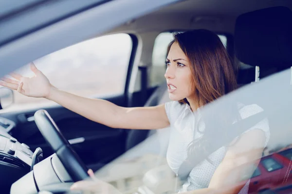 Angry Attractive Caucasian Brunette Yelling Other Drivers While Sitting Car — Stock Photo, Image