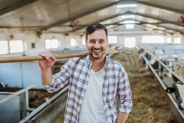 Young Smiling Cheerful Unshaven Caucasian Farmer Standing Barn Hayfork Shoulder — 스톡 사진