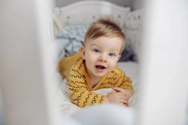 Cute Little Blond Baby Boy Lying Stomach Crib Morning Looking — Stockfoto