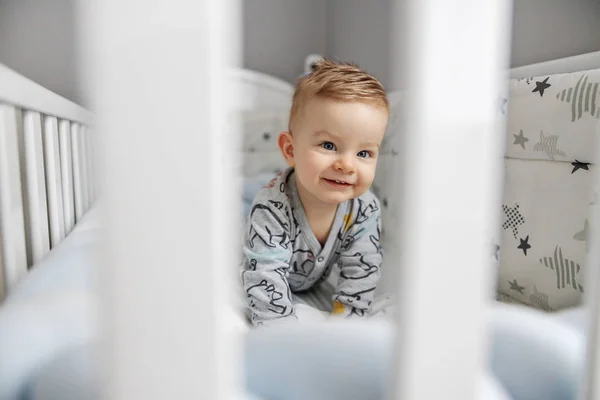 Cute Blond Smiling Little Baby Boy Lying Stomach His Crib — Stock Photo, Image