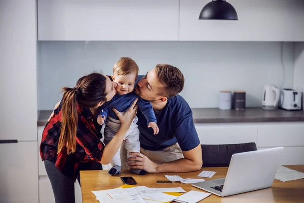 Young Happy Proud Parents Standing Kitchen Kissing Only Beloved Son — Stock Photo, Image