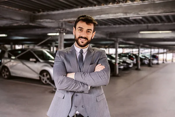 Young Successful Bearded Auto Dealer Suit Standing Parking Lot Arms — Stock Photo, Image