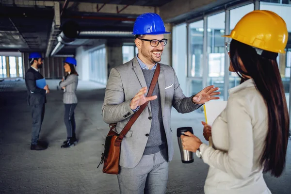 Two Charming Colleagues Standing Building Construction Process Chatting Taking Break — 스톡 사진