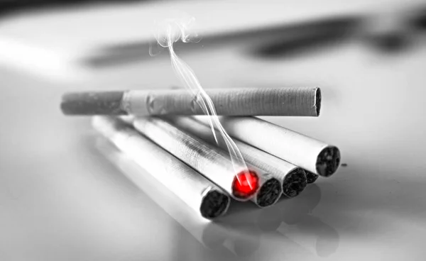 Cigarettes pile black and white — Stock Photo, Image