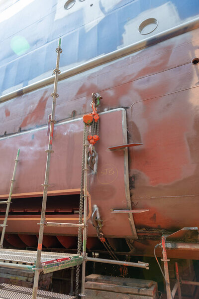 Passenger vessel in dry dock on ship repairing yard