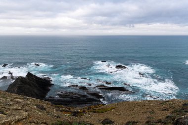 Beautiful rocky coastline and blue sea in Portugal