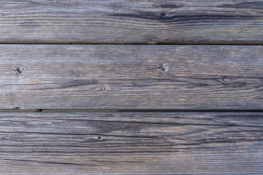 Dark wooden background texture. Old fence panels with natural patterns.